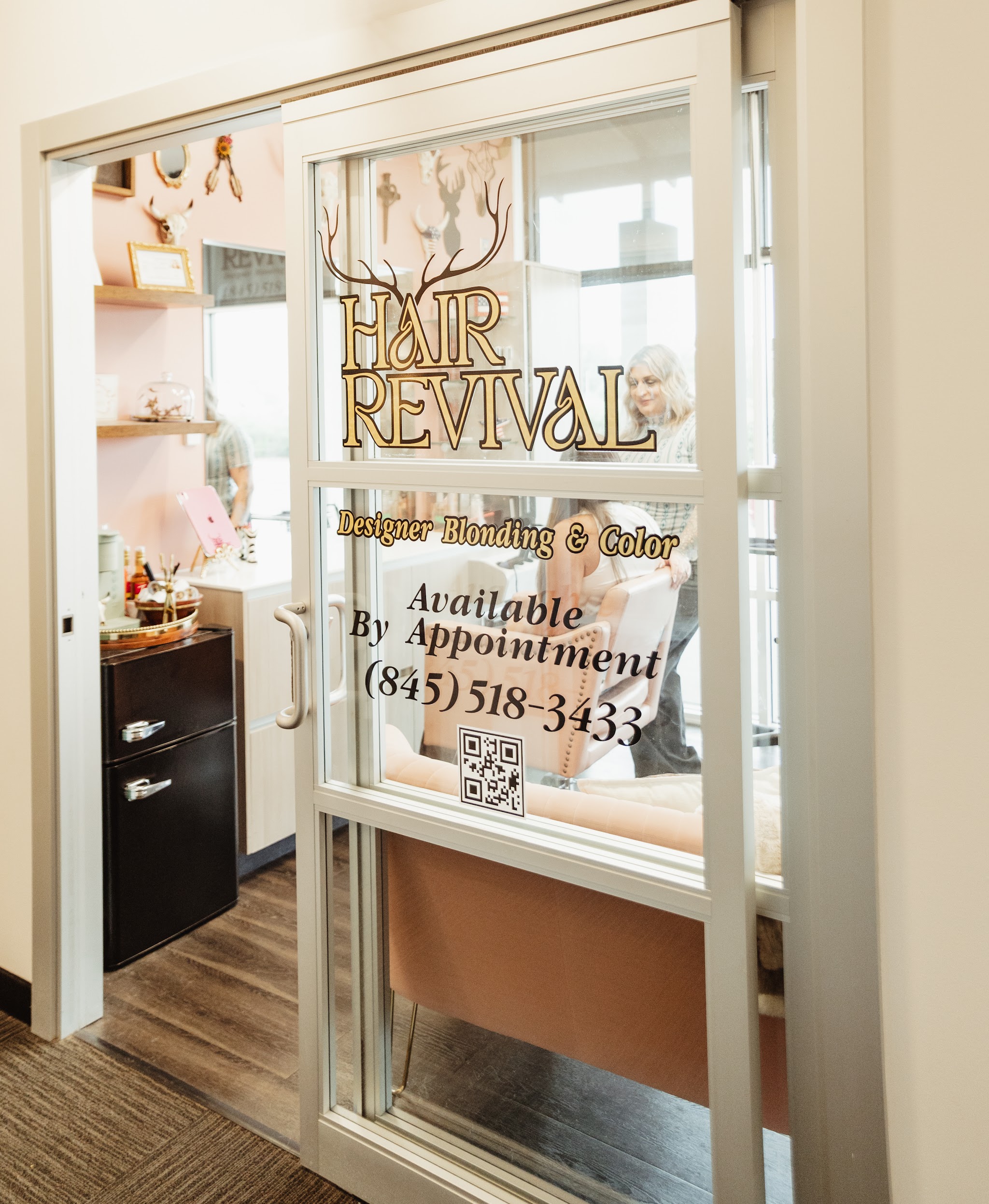 Our studio door reading Designer Blonding and Color, available by appointment